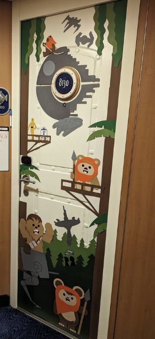 A full-length Star Wars themed Disney cruise stateroom door banner