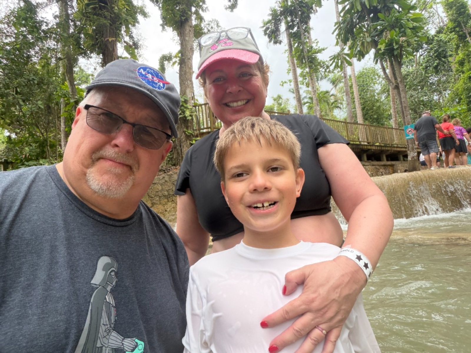 A family selfie beside the water at Dunn’s River Falls
