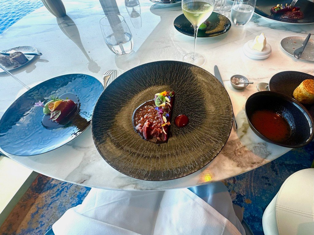 Adult specialty dining with ocean views on a Disney cruise