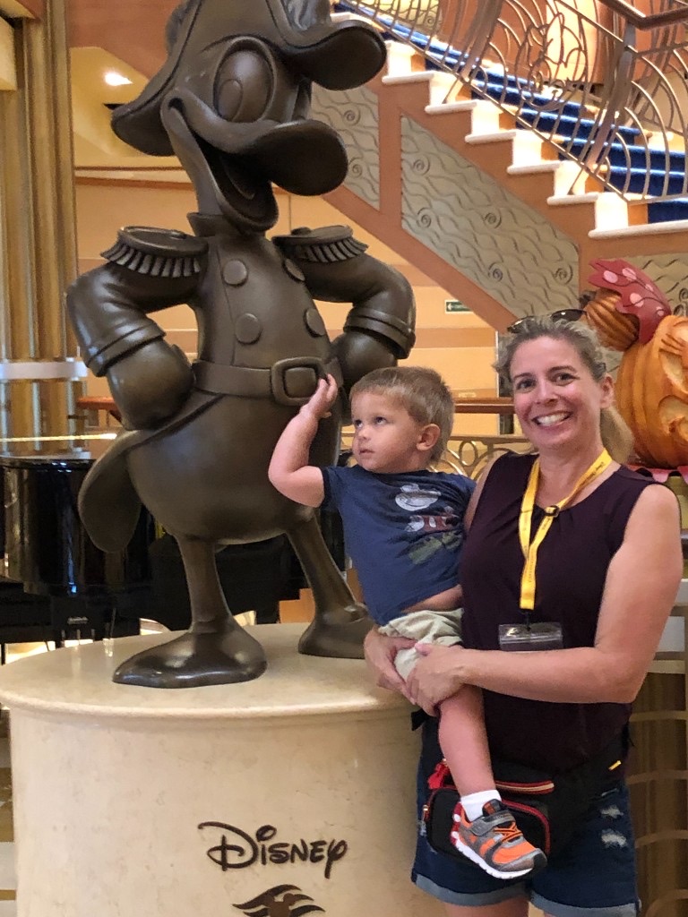 Admiral Donald Duck atrium statue on Disney Dream